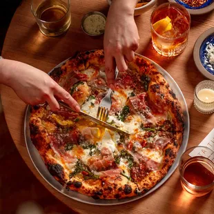 Prosciutto and broccolini pizza, only available at dinner