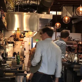 a group of people in a restaurant