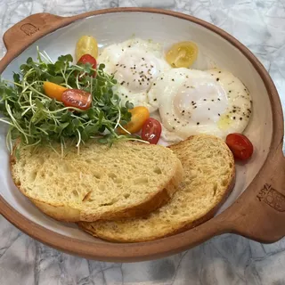 Sunny Side-Up Eggs on Melted Butter with Rye Toast