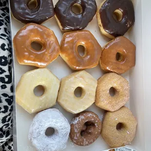 Assorted dozen - chocolate iced, caramel iced, glazed, cinnamon sugar, powdered, and seasonal favorite (not my favorite) pumpkin spice