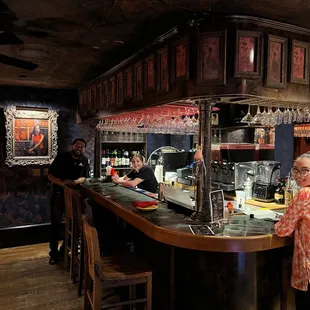 a woman sitting at the bar