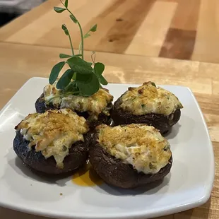 a plate of stuffed mushrooms