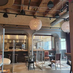 a view of a kitchen and dining area