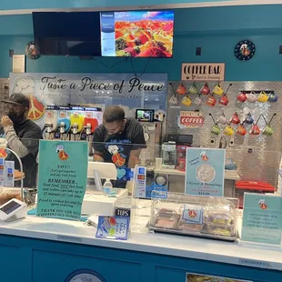 two men at a counter
