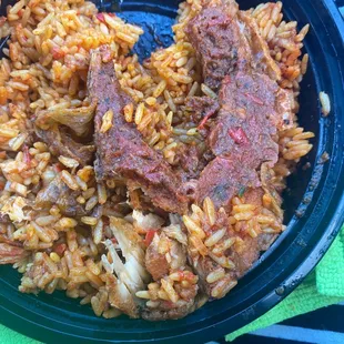 Jollof Rice with fish steak.