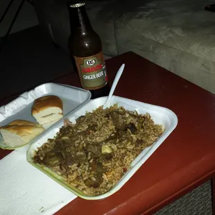 Curry goat, coco bread and ginger beer...