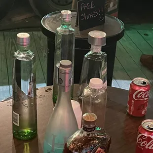 a variety of alcohol bottles on a table