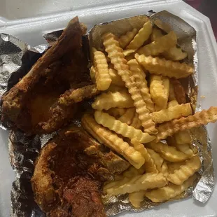 Fried pork chops and fries