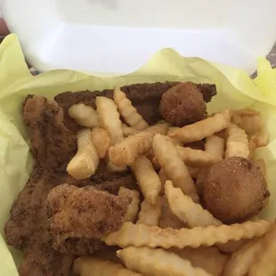 Fried fish combo comes with french fries and hush puppies!!!