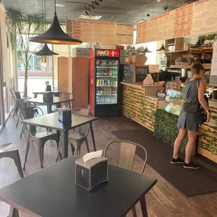 a woman standing at the counter