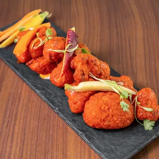 Buffalo Soldier

Deep Fried Buttermilk Buffalo Cauliflower with Blue Cheese Dressing