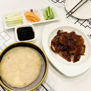 a bowl of rice and a bowl of meat