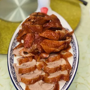 a plate of sliced pork