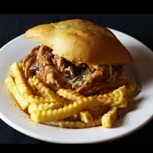 a plate with a sandwich and french fries