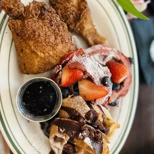 Spicy chicken, red velvet and chocolate chip waffles