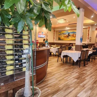 You&apos;re greeted by a wine cellar stacked to the ceiling- with Caymus and Duckhorn, no less.