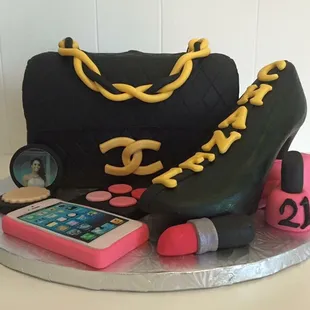 a handbag, purse, lipstick, and cell phone