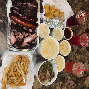 The Gang Meats: Ribs, Rib tips, Chicken, Sausage Links Sides: Mac, Fries, Potato Salad, Green Beans, Corn Bread