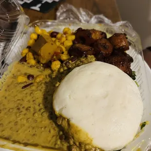 Fufu, lentils, greens and cabbage, plantains and corn!