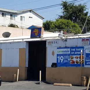 a car parked in front of a restaurant