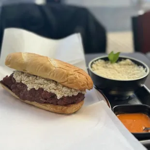 Kitfo sandwich with rice and homemade sauce