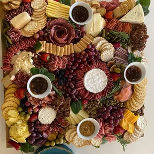 Gorgeous charcuterie boards, tablescapes and individual charcuterie cups - perfect for mingling!