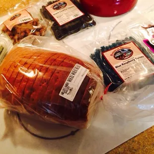 Loot from my (cheap!) treasure hunt at Taste of Amish: wheat loaf, beef jerky x2, candy twists x2, peanuts and honey!