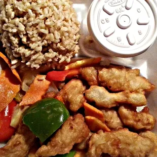 Lunch 2-Go Sweet and Sour Chicken with Brown Rice and Red Sauce. Side Note: Brown Rice no good....