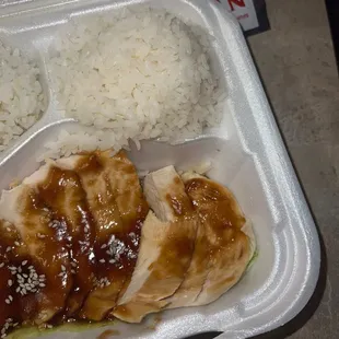 chicken and rice in a styrofoam container