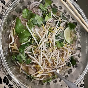 Carry out pho P11 with eye round steak and tendon.