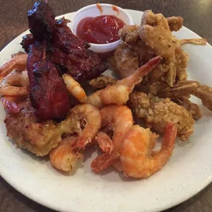 Man Heaven! Frog legs, shrimp and chicken.