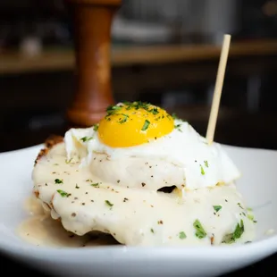 The chicken biscuit and gravy!  Delicious fried chicken on top of a butter milk biscuit, covered in gravy with a fried egg on top!