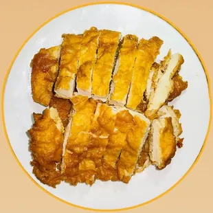 sliced chicken breast on a plate
