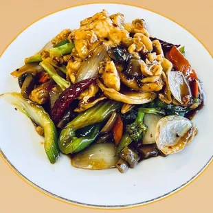 a plate of stir fried vegetables