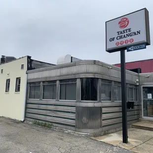 Entry &amp; driveway to small parking lot