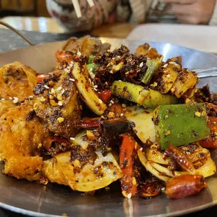 a plate of chinese food
