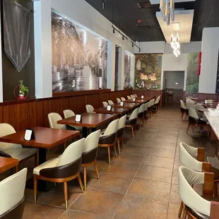 a restaurant with tables and chairs