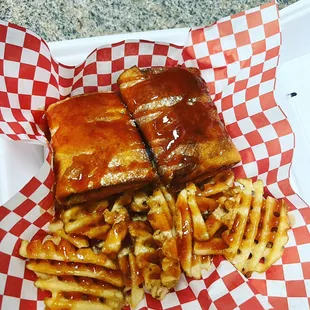 Chicago style Pizza puffs with waffle fries dripping with mild sauce.