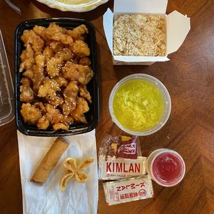 Family dinner with Sesame Chicken, Egg Drop Soup, and Fried Rice