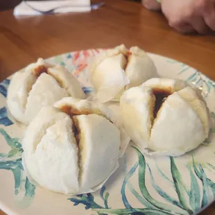 Steamed pork buns. They were dry and hard.