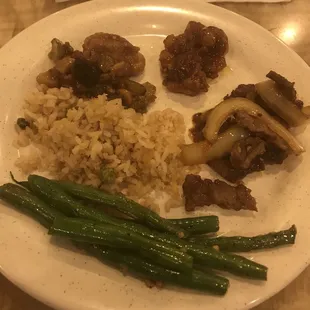 Clockwise: green beans, rice, Chicken W. Cashew Nuts, General Tso's Chicken, Mongolian beef