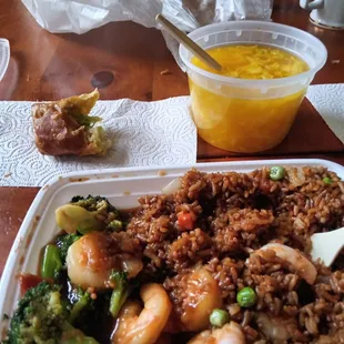 Shrimp and broccoli with shrimp stir fried rice, egg drop soup, almost gone egg roll :)