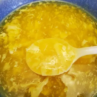 a spoon in a bowl of soup