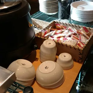 Plates, bowls and a homemade soup