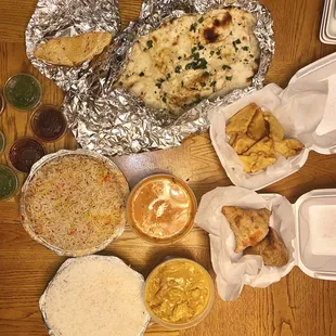 28. Mild Chicken Korma 35. Mild Lamb Tikka Masala 73. Garlic Naan 2. Paneer Pakora 6. Keema Samosa