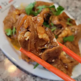 Pork feet in secret sauce had an addicting sweet savory sauce; skin crunchy. Less meat for the beer