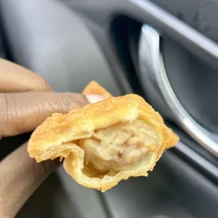 a person holding a pastry