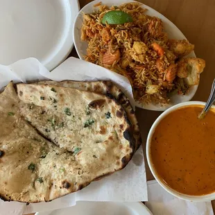 Garlic naan and plain naan, vegetable biryani, chicken tikka masala