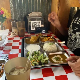 My dad with his huge piece of chiken