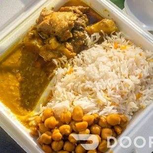 a meal in a styrofoam container